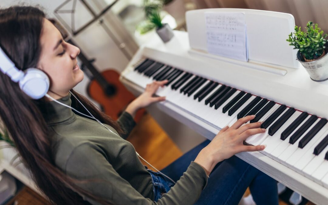 A young girl playing a keyboard, her fingers gracefully pressing the keys, deeply immersed in the music